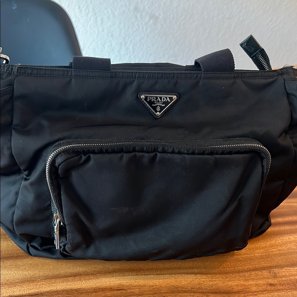 Prada Black Duffel Bag with Durable Nylon and Iconic Design